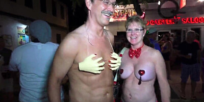 Cheerful women flash beautiful boobs in the street