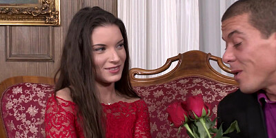 A teen that has a pretty mouth is sucking two large dicks