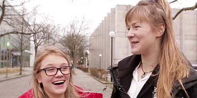 Two nerdy female students are experimenting with their sexual orientation