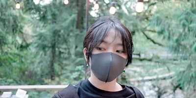 Asian girl wears a Covid mask while being fucked on the balcony