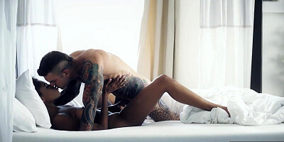 Black babe with curly hair is getting bonked by her lover
