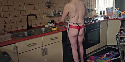 Cinematic film in which the husband films his wife undressed in the kitchen, behind the scenes
