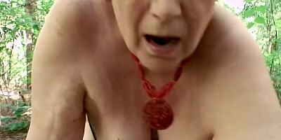 Short-haired mature woman is having POV sex in the woods