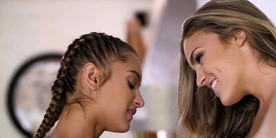 Two girls are getting naked in the kitchen and they are making lesbian love