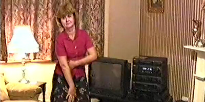 Mature tenderly dances and strips down on camera