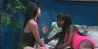 Interracial lesbian sex scene with black babe and white chick