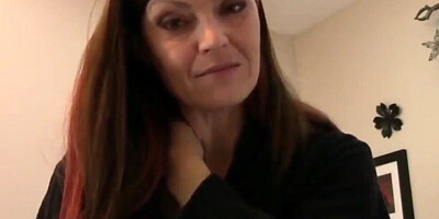 Charming cougar talks dirty and plays with a dildo in POV video