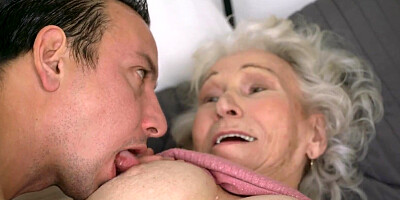 Kinky guy licks grabdma's tits and cunts before fucking her