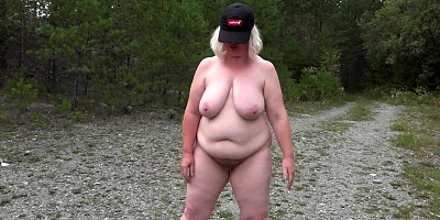 Chubby amateur mature is posing naked out in the open