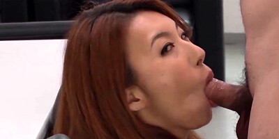 Juicy Japanese secretary goes down on her boss and blows him