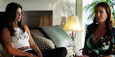 Two gorgeous dykes are using a sex toy during oral intercourse