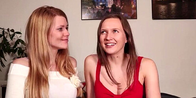 Two cute lesbian babes are playing with each other's cunt