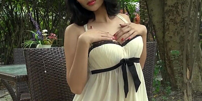 Smoking hot Asian gal is enjoying outdoor masturbation in her backyard