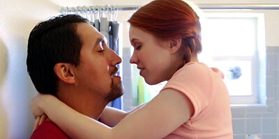 Teen redhead is giving a blowjob to her randy stepdad before getting banged by him