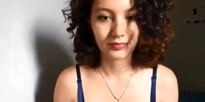 Adorable curly-haired lady is going to show you her natural tits and ass