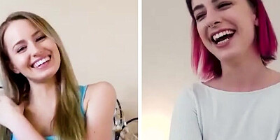 Two hot ladies are skyping and rubbing their pussies together