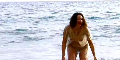 Round ass doll gets fucked hard from behind on a beach