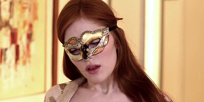 Red-haired stunner masturbates on the couch on alone