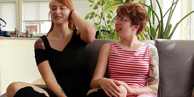 Two redhead lesbians are licking each other's tits and pussies