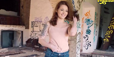 Lustful redhead is getting pussy banged by a tattooed guy in an abandoned building