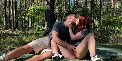 Ginger girl and her boyfriend are enjoying outdoor doggy sex on their picnic