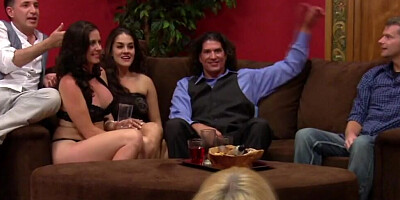 A couple of swinging couples gathered in a mansion for a wild orgy
