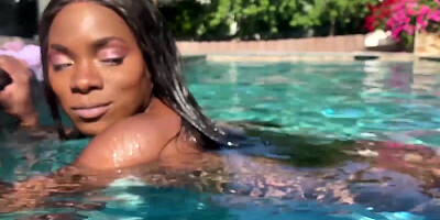 Delightful ebony model Ana Foxxx gets nude and plays in a swimming pool