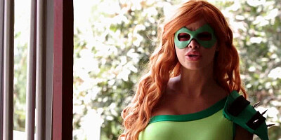 Red-haired super-hero gives her perfect mouth and pussy