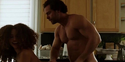 Curly-haired ebony doll bounces on the white man's dick in a kitchen