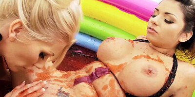 Two sexy lesbians are rolling in the mud pool and having some soft BDSM action