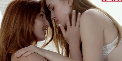 Sensual ginger and blonde girls are giving each other wonderful pussy licking treats