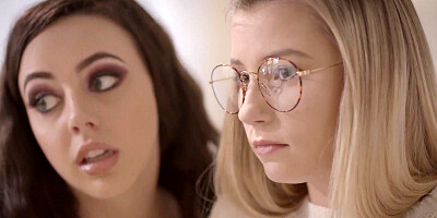 Curly-haired girl and a nerdy blonde are sharing a big prick