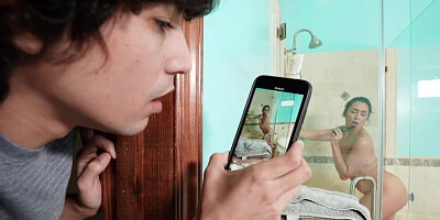 Teen boy is filming his young stepmom taking a shower and masturbating