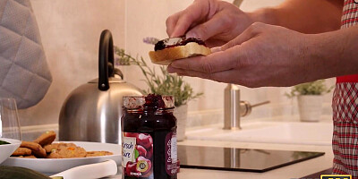 Married couple practices sex in the kitchen