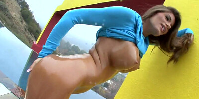 Completely in oil and with her sweater on Madelyn Marie is masturbating