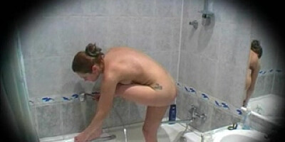 Youthfull redhead shower spycam