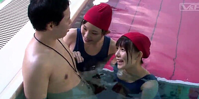 Japanese schoolgirls polish dick under the water