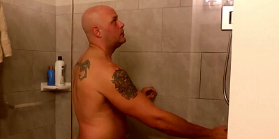 Bad Bella giving a handjob in the shower to a baldie