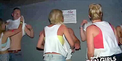 Girls In A Night Bar Are Kissing Each Other While Dancing And Slowly Taking Off Their Clothes